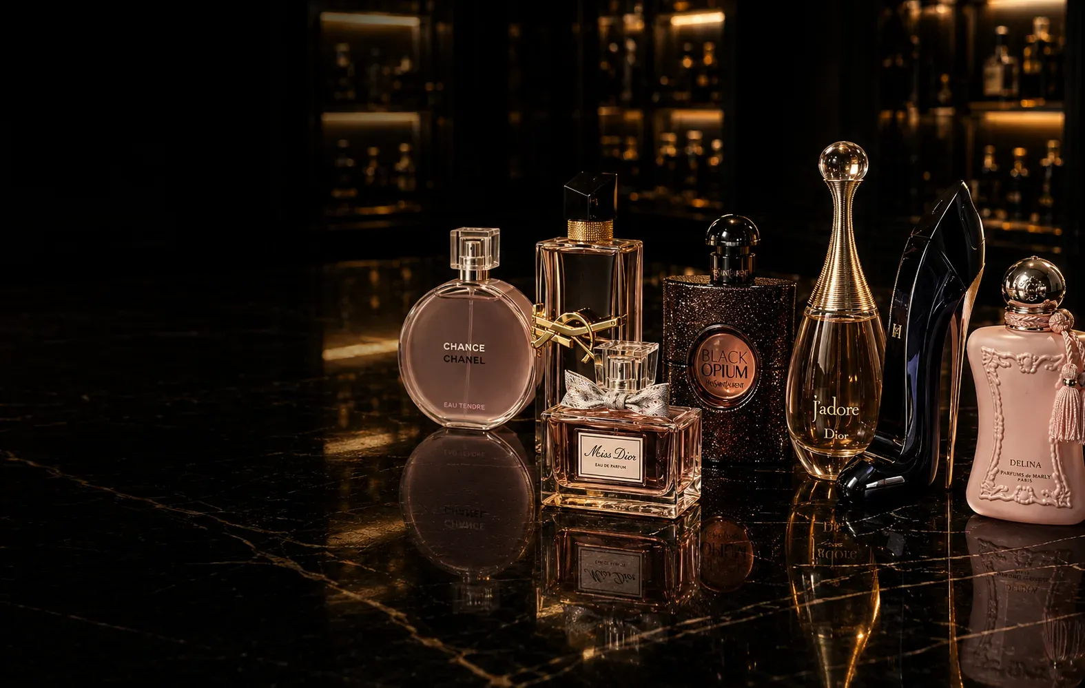 Women’s fragrances lined up on black marble